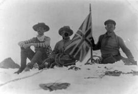 "Warren, Trorey, and King with Union Jack flag on the summit of Mt. Garibaldi, 1907"