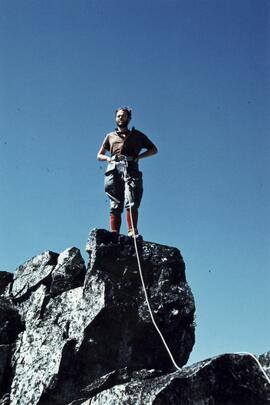"M. Feller near summit of Rhododendron 1st ascent, July 1971"