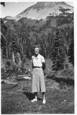 "Rosemary Weaver in meadow beneath Black Tusk, 1935"